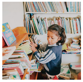 Love Made Visible Orphan with Books