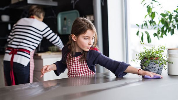Girl Cleaning Kitchen Counter - Greener, Cleaner Lifestyle